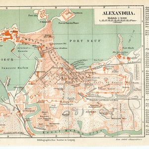 May include: A vintage map of Alexandria, Egypt, showing the city's layout and key landmarks. The map is printed in shades of green, orange, and brown, with text in German. The map includes the port, the city center, and surrounding areas.