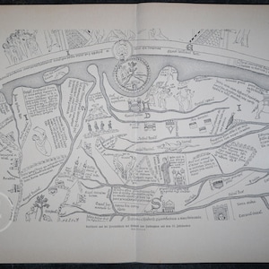 May include: A black and white historical map illustration featuring intricate line drawings of landscapes, buildings, and figures. The map includes extensive Latin text annotations, a central circular emblem, and a river system winding through the terrain.