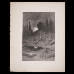 May include: A black and white engraving of a cemetery at night. The image features numerous crosses, tombstones, and a full moon. A bat flies in the foreground. The print is on aged paper with visible wear and tear.
