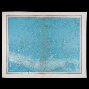 May include: A vintage celestial star map printed on light blue paper, titled Maps of the Stars No 5 The North Pole. The chart features white star constellations, grid lines, and astronomical text, with publication details at the bottom.