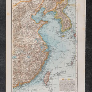 May include: An antique printed map titled Ostchina und Korea, featuring detailed topography of East China, the Korean Peninsula, and surrounding seas. The map uses muted earth tones for landmasses and light blue for water, with a legend in the corner.