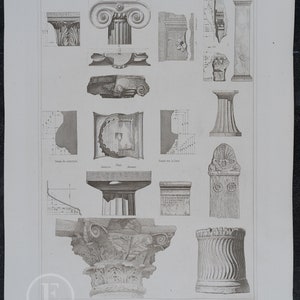 May include: A black and white illustration of various architectural fragments from ancient Greece. The image includes columns, capitals, and other decorative elements. The text "FRAGMENTS ANTIQUES VOL. II" is visible at the top of the image.