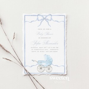 Sweeten Studio's template which includes a soft pastel blue watercolor background with a subtle fabric texture, a carriage, and a delicate blue ribbon-style border, sized for a 5x7 baby shower invitation.