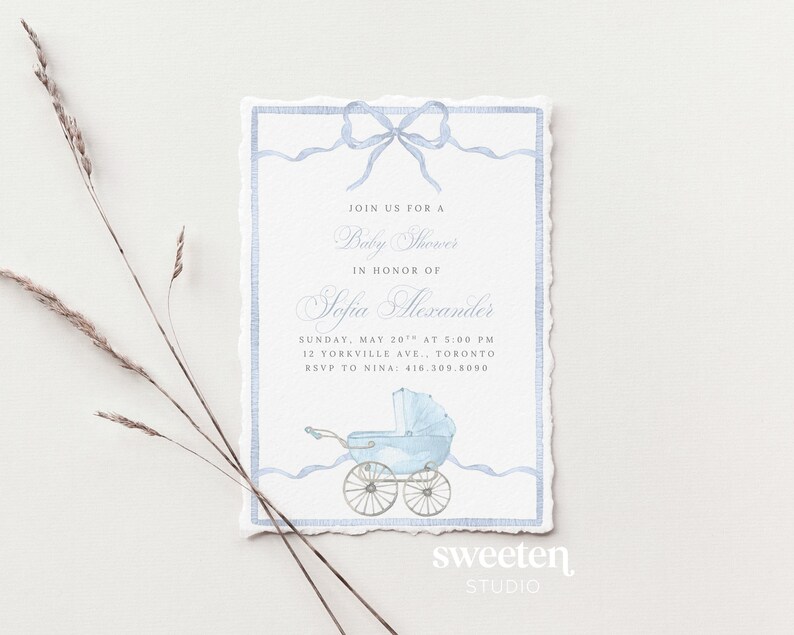 Sweeten Studio's template which includes a soft pastel blue watercolor background with a subtle fabric texture, a carriage, and a delicate blue ribbon-style border, sized for a 5x7 baby shower invitation.