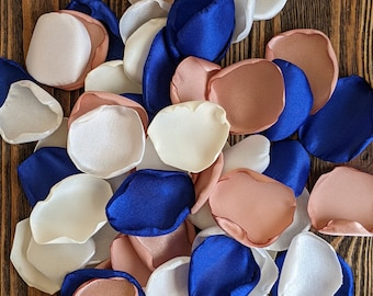 Royal blue and rose gold wedding cake decorations, flowers for flower girl baskets, rose petals wedding toss and centerpieces, party decor