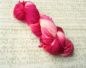 Pink and white variegated hand dyed sock yarn, indie dyed yarn, 100% superwash merino wool, colorway: Lipstick on Your Collar