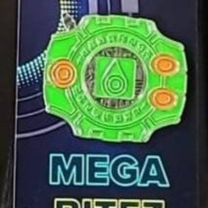 May include: Green and orange enamel pin featuring a stylized design of a digital device with the text "MEGA BITEZ" printed below.