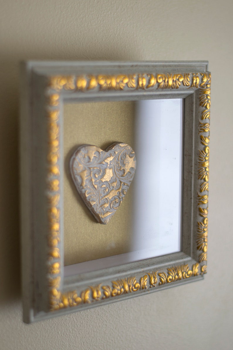 Heart framed gold glitter wall art