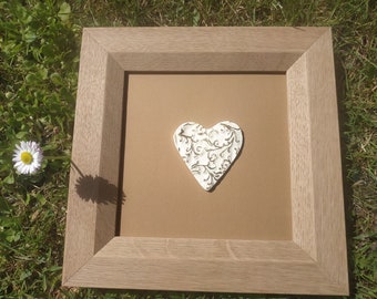 Oak frame ceramic heart wood decor