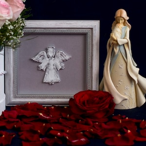 Silver picture framed guardian angel decor