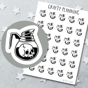 May include: A sticker sheet titled Crafty Planning featuring multiple black and white illustrations of a coffee carafe containing a human skull. A larger circular sticker with the same coffee carafe and skull design is layered over the sheet.