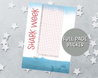 May include: A full page sticker featuring the text SHARK WEEK in red, a grid with numbers 1 through 31 and letters J F M A M J J A S O N D, and an illustration of a person swimming in blue water with a shark visible beneath the surface.