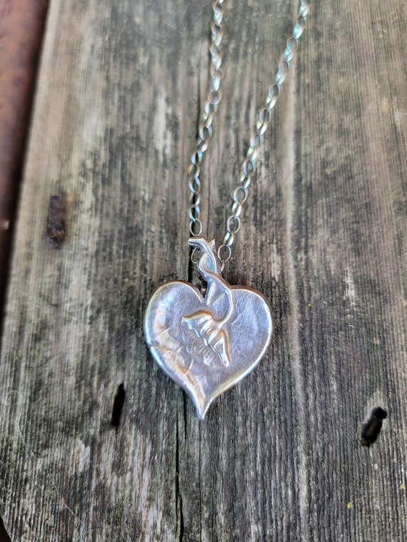 Art nouveau tulip pendant necklace. Sterling silver antique necklace. Heart shape pendant necklace.