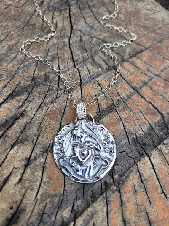 1900's French art nouveau pendant necklace. Sterling silver antique necklace