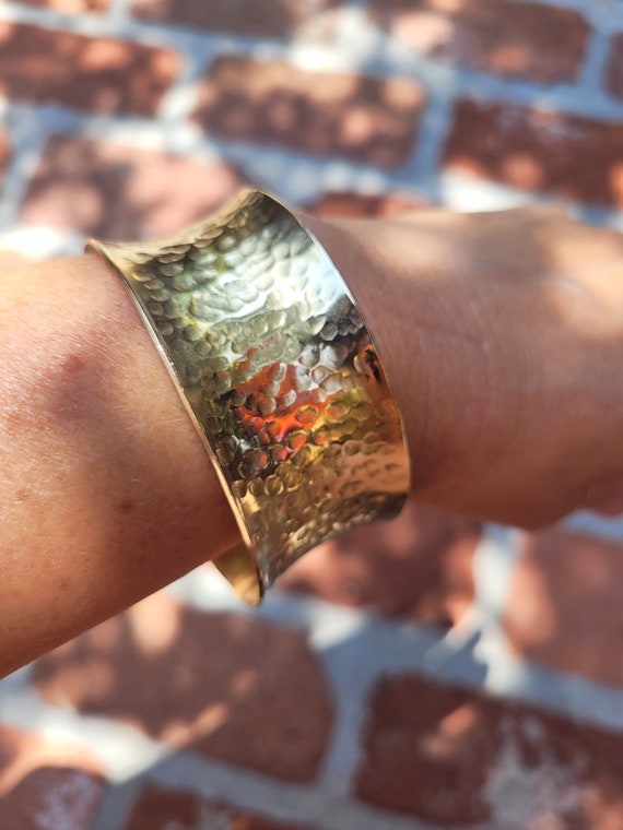 Anticlastic gold tone brass cuff bracelet.  Hammered cuff bangle bracelet.  Thick cuff bracelet.