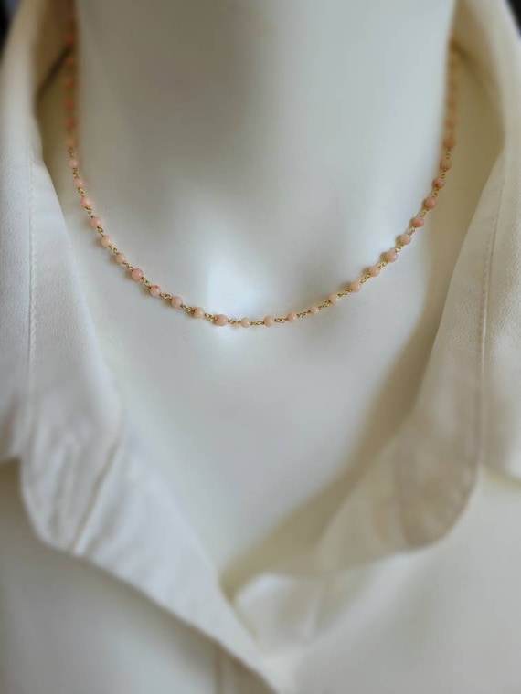 Dainty vintage angel skin coral necklace.  Gold angel skin coral. Long angel skin coral