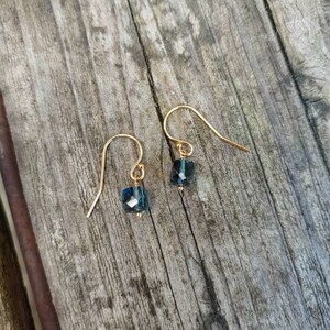 Dainty London blue topaz earrings. Silver london blue topaz earrings. Gold london blue topaz earrings. Rose gold london blue topaz earrings