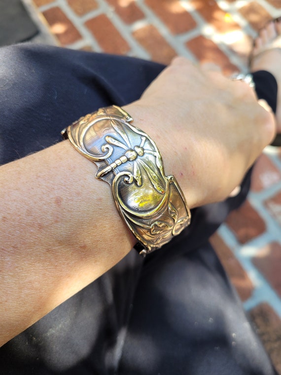Art nouveau repousse gold tone brass cuff bracelet.  Dragonfly cuff bangle bracelet.  Thick cuff bracelet.