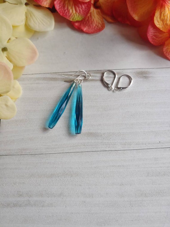 Long london blue topaz earrings. Blue topaz earrings. Sterling silver blue earrings