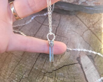 Aquamarine pendant necklace.   Sterling silver aquamarine pendant.