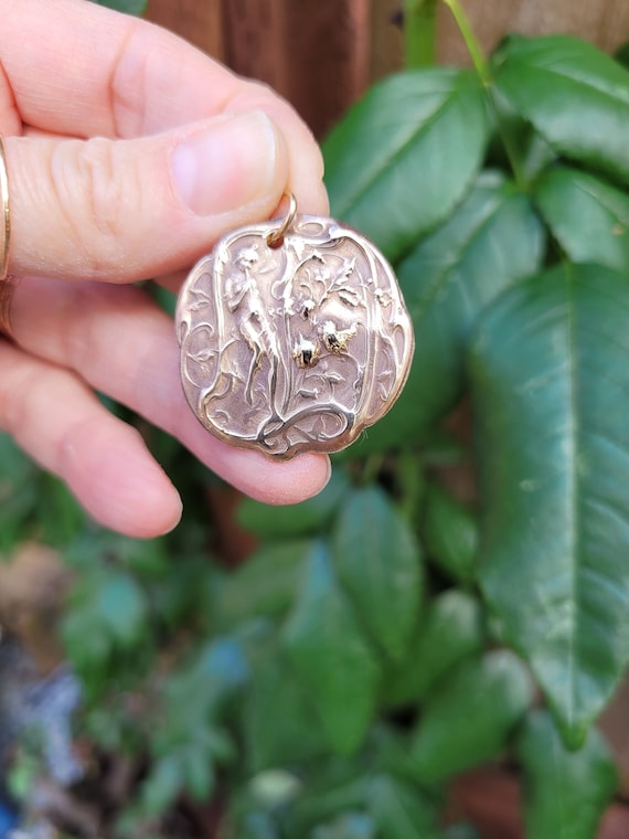 Gold french art nouveau flute playing fairy pendant. Brass fairy necklace