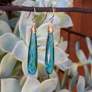 Long blue topaz earrings. Topaz earrings.  Avail in gold filled, rose gold, and or sterling silver.  Unique topaz earrings