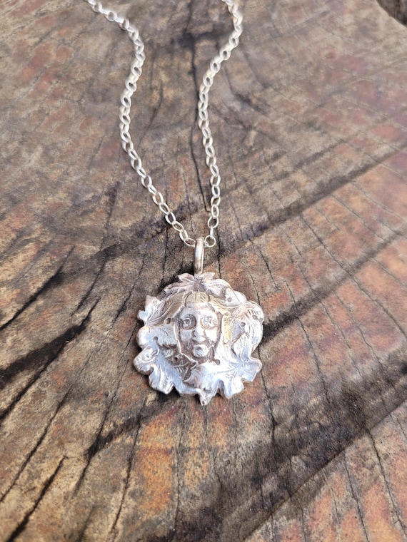 1900's French green woman / man pendant necklace. Sterling silver antique necklace. Rebirth. Foliage head