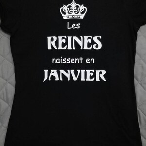 May include: Black t-shirt with a white crown graphic and the text "Les Reines naissent en JANVIER".
