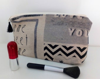 Trousse en coton beige et noire fantaisie