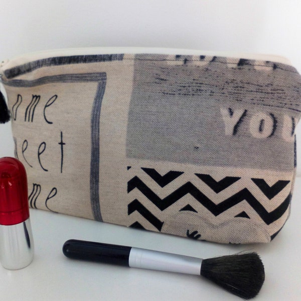 Trousse en coton beige et noire fantaisie