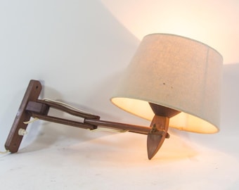 Hinged wall lamp | Teak wood | Danish design | Vintage 60's