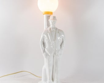 Postmodern table lamp | White ceramic | Man and lamp post | vintage 80's