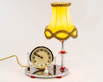 Art deco lamp with clock