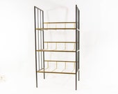 Midcentury magazine and newspaper stand Brass metal frame Made around 1960