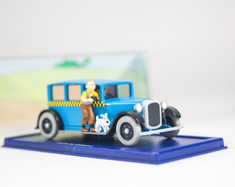 Modèle de voiture TinTin | 1/24 | Taxi bleu | TinTin en Amérique | Boîte d'origine et certificat | Édition Atlas