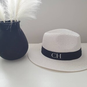 Personalised Beach Hat with initials printed on the front. These straw hats are ideal for a holiday or honeymoon. Matching his and hers fedora straw hats.