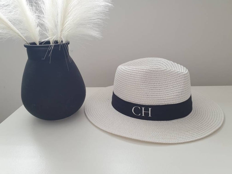 Personalised Beach Hat with initials printed on the front. These straw hats are ideal for a holiday or honeymoon. Matching his and hers fedora straw hats.