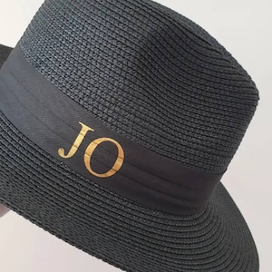 Personalised Beach Hat with initials printed on the front. These straw hats are ideal for a holiday or honeymoon. Matching his and hers fedora straw hats.