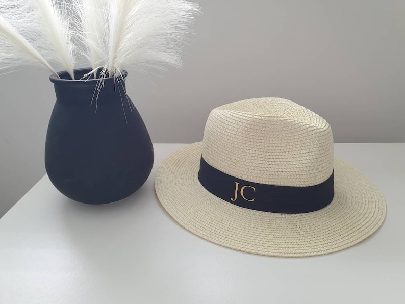Personalised Beach Hat with initials printed on the front. These straw hats are ideal for a holiday or honeymoon. Matching his and hers fedora straw hats.