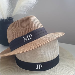 Personalised Beach Hat with initials printed on the front. These straw hats are ideal for a holiday or honeymoon. Matching his and hers fedora straw hats.