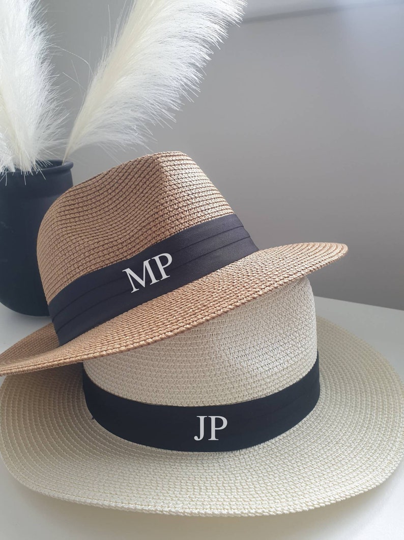 Personalised Beach Hat with initials printed on the front. These straw hats are ideal for a holiday or honeymoon. Matching his and hers fedora straw hats.