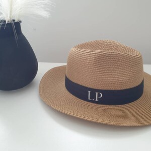 Personalised Beach Hat with initials printed on the front. These straw hats are ideal for a holiday or honeymoon. Matching his and hers fedora straw hats.