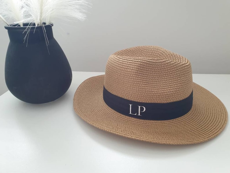 Personalised Beach Hat with initials printed on the front. These straw hats are ideal for a holiday or honeymoon. Matching his and hers fedora straw hats.