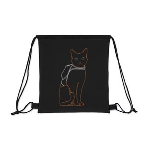 May include: Black drawstring bag with a line drawing of an orange cat with green eyes. The cat is wearing a white collar.