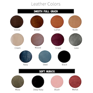 May include: Leather color chart showing 14 different colors of leather. The chart is divided into two sections: Smooth Full Grain and Soft Nubuck. The colors include Cocoa, Brown, Camel, Nude, Cream, Mauve, Grape, Lava, Navy, Steel, Black, Moss, Deep Navy, Blush, and Merlot.