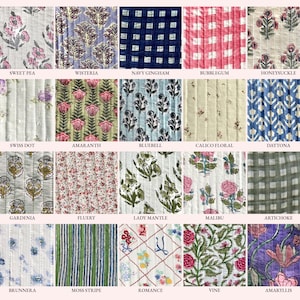 May include: A grid of twenty fabric swatches featuring various patterns including floral, gingham, stripe, and dot designs. Each swatch is labeled with names like Sweet Pea, Wisteria, Navy Gingham, Bubblegum, Honeysuckle, Swiss Dot, Amaranth, Bluebell, Calico Floral, Daytona, Gardenia, Fluery, Lady Mantle, Malibu, Artichoke, Brunnera, Moss Stripe, Romance, Vine, and Amaryllis.