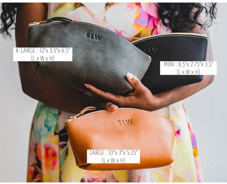May include: Three leather cosmetic bags in different sizes. The largest bag is dark green, the medium bag is brown, and the smallest bag is black. The bags have a curved shape and a zipper closure. The bags are labeled with the text "SLW" and their dimensions in inches: X-LARGE: 12"x 3.5"x 6.5" (L x W x H), LARGE: 10"x 3"x 5.25" (L x W x H), MINI: 8.5"x 2.75"x 3.5" (L x W x H).
