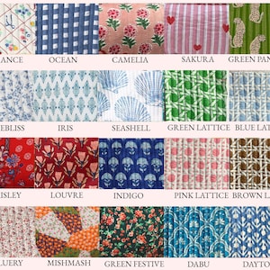 May include: A collection of patterned fabric swatches, each with a unique design and color scheme. Designs include floral, geometric, and abstract patterns in various colors like blue, pink, green, and red. Each swatch is labeled with a name.