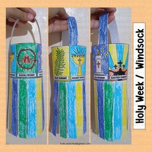May include: A colorful paper craft windsock with a handle, depicting the events of Holy Week. The windsock is decorated with images of a cross, a palm branch, a chalice, a candle, and a scene of the resurrection. The text "GOOD FRIDAY", "PALM SUNDAY", "MAUNDY THURSDAY", "HOLY SATURDAY", and "EASTER SUNDAY" is printed on the windsock.