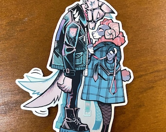 May include: A sticker depicting two animal figures in a close embrace. One is a wolf in a black jacket and boots, the other a ram in a blue plaid coat. A third animal figure is visible in the background. The sticker has a white border.